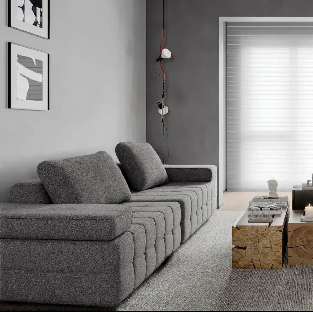 A grey Nesto sofa in a living room